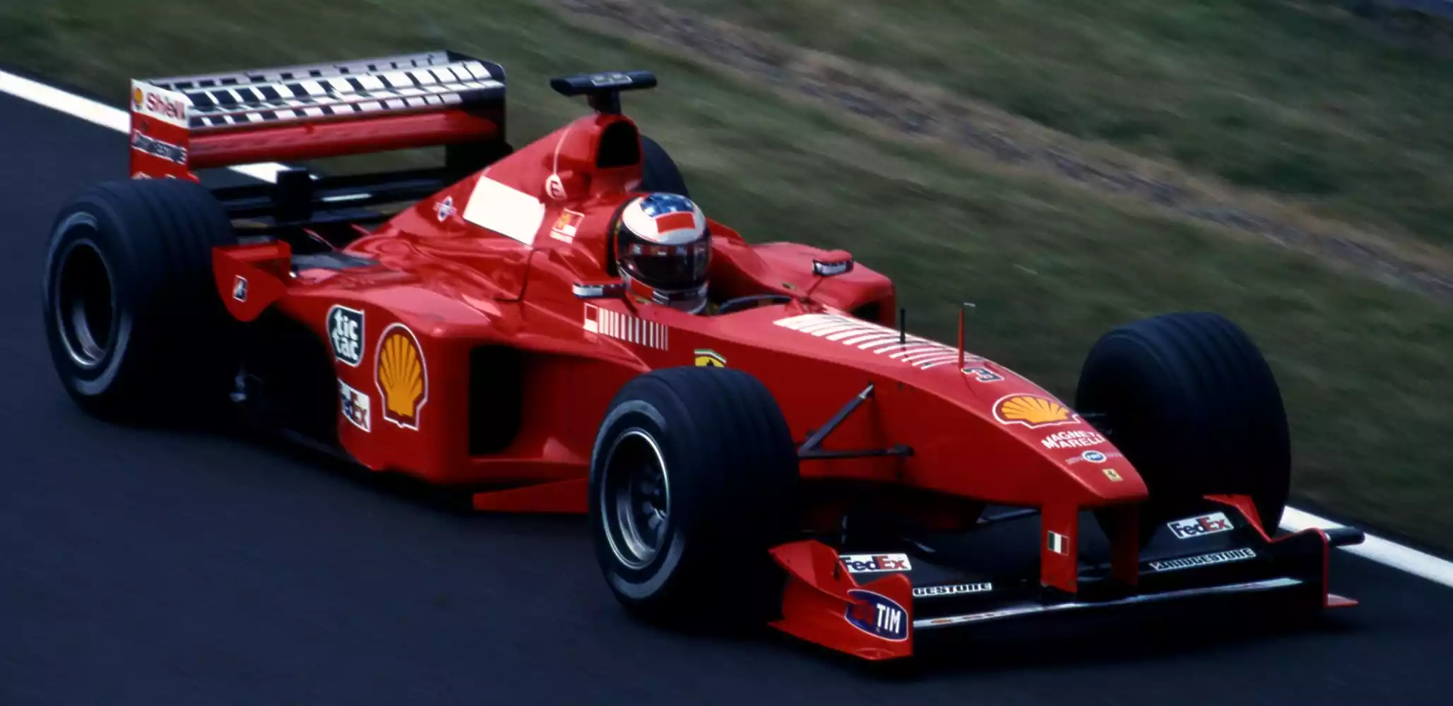 A Ferrari F399 with a barcode pattern replacing the Marlboro name.
